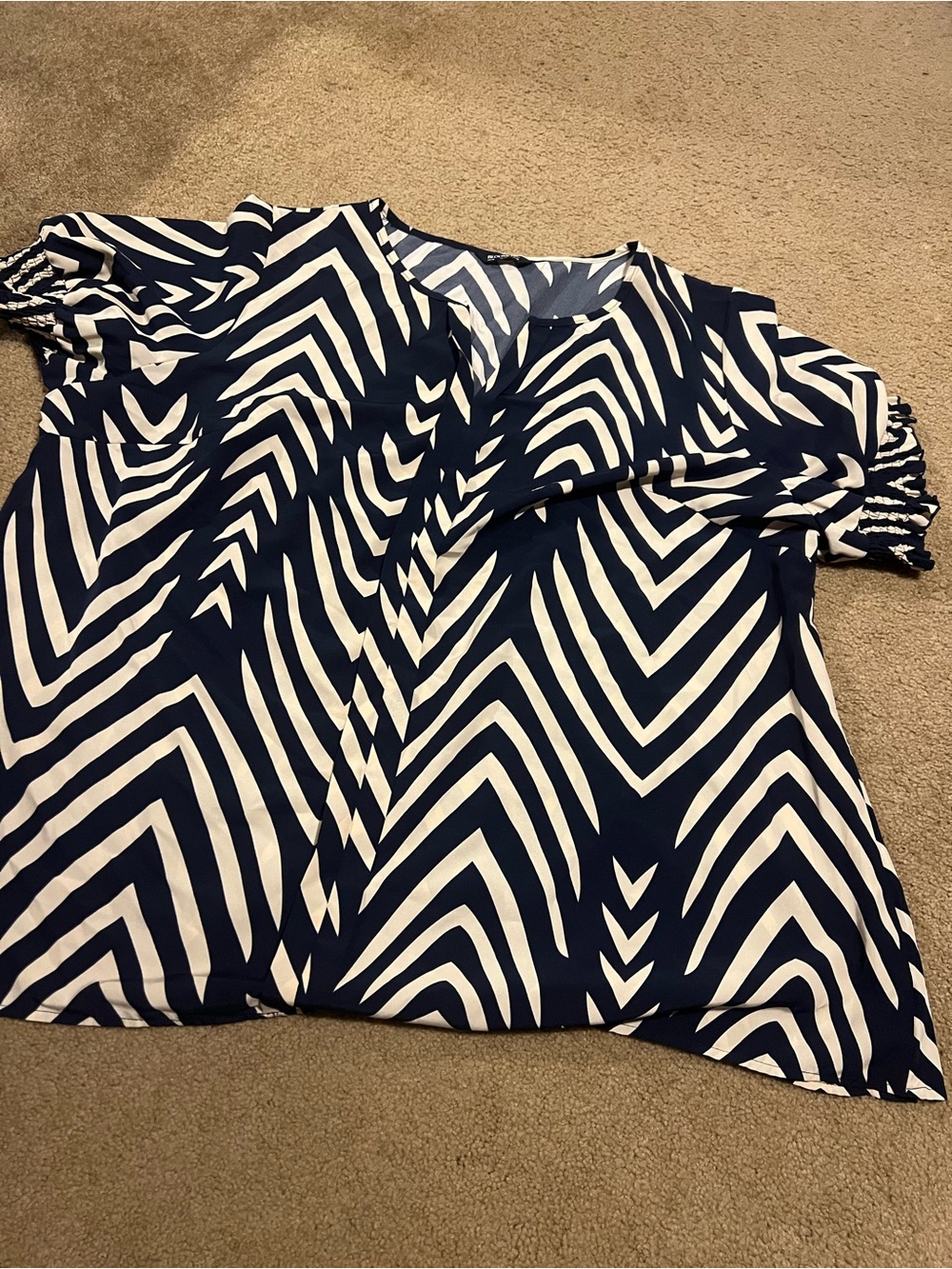 BloomChic Navy and White Geometric V-Neck Blouse